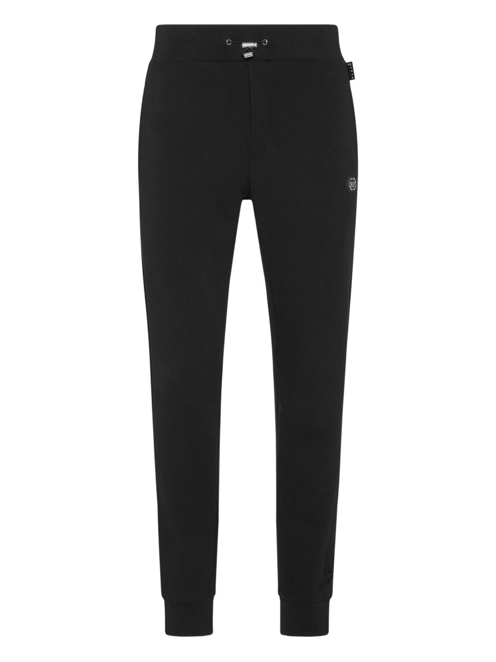 skull-studded track pants