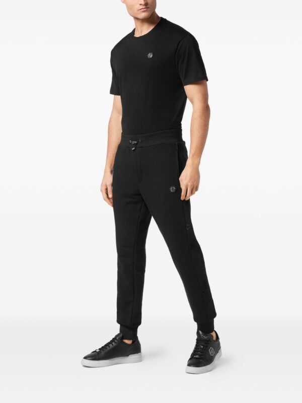 ⁦skull-studded track pants⁩ - الصورة ⁦3⁩