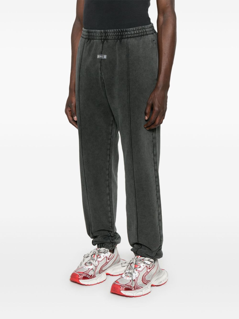 stone-washed track pants