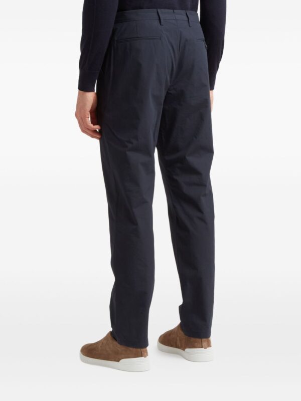 pleated tailored trousers